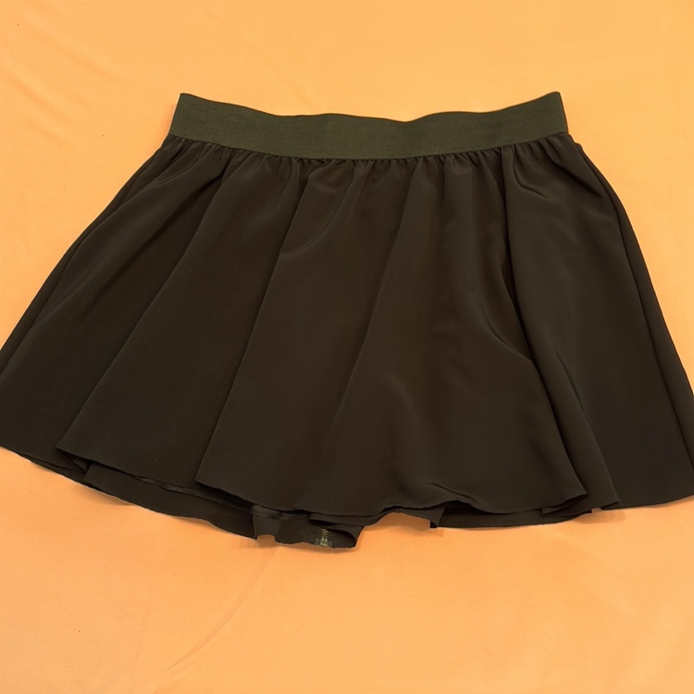 New Black 5148 Mini Skirt. Black. Lined Size M.